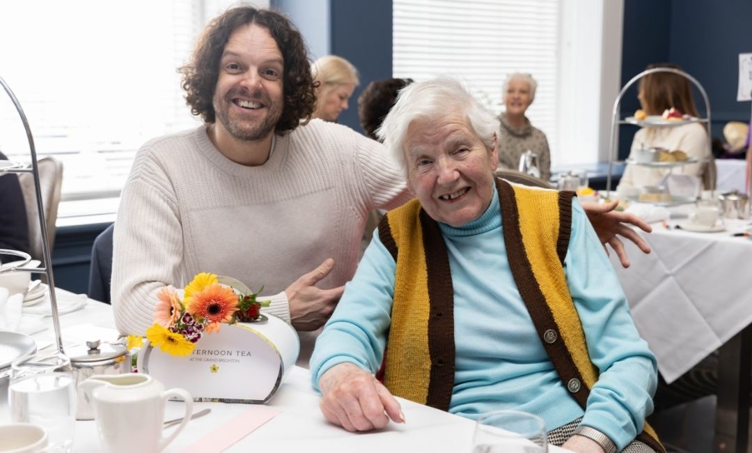 Together Co service users at tea event